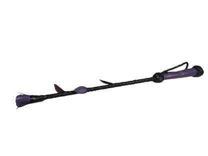 Luxury hand-made leather rose riding crop with purple stem & black rose tip. Fiberglass core, 680 mm length. Perfect for BDSM play.