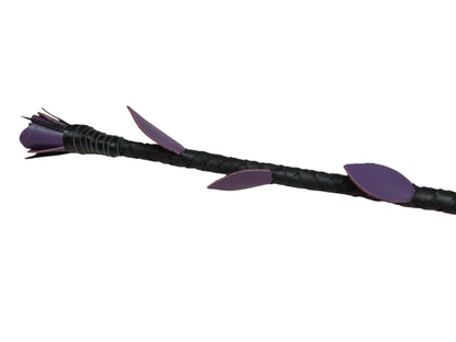 Luxury hand-made leather rose riding crop with purple stem & black rose tip. Fiberglass core, 680 mm length. Perfect for BDSM play.
